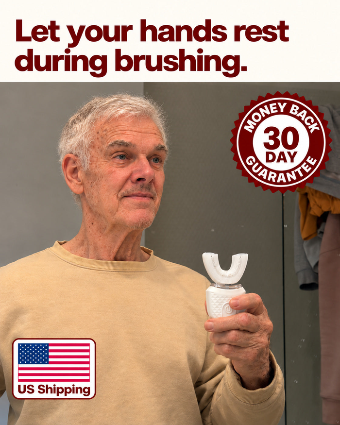 Older man holding Dentarel U Brush in his bathroom